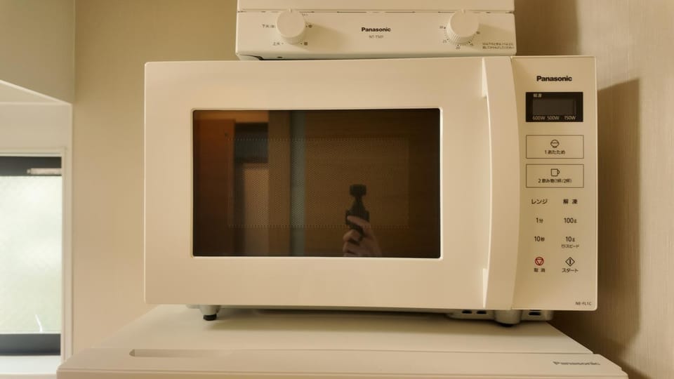 Kitchen or kitchenette, microwave