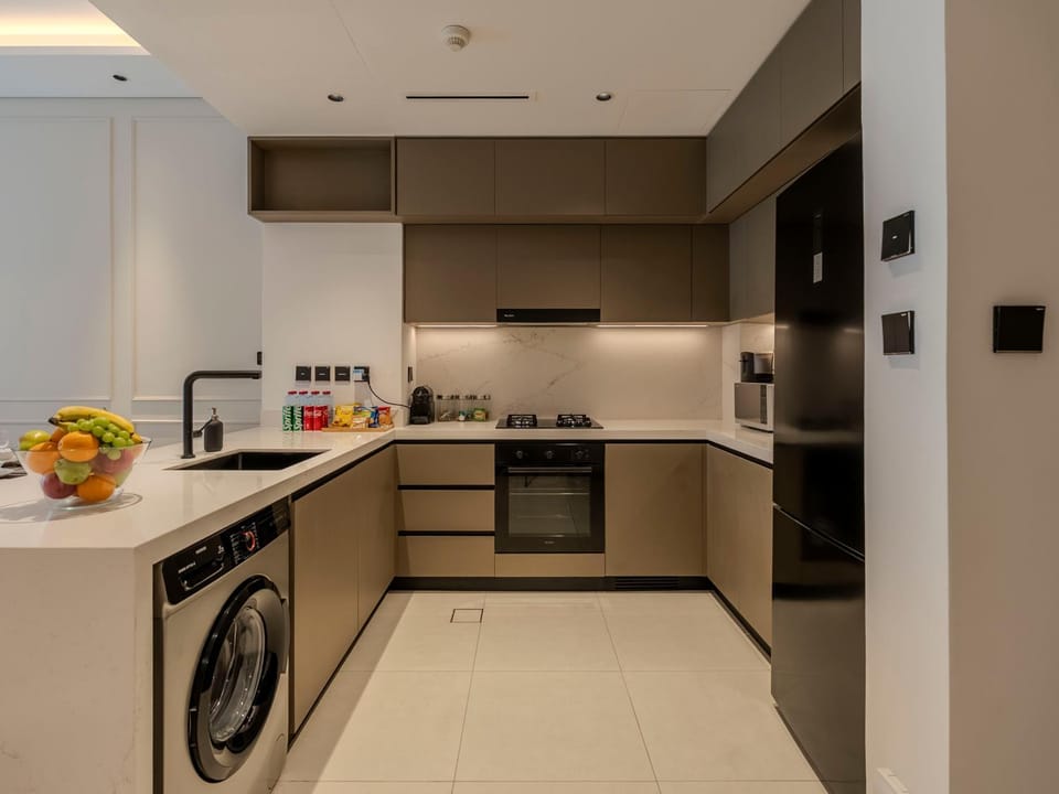 Coffee/tea facilities, Kitchen or kitchenette, dishwasher, oven, stove, toaster, washing machine