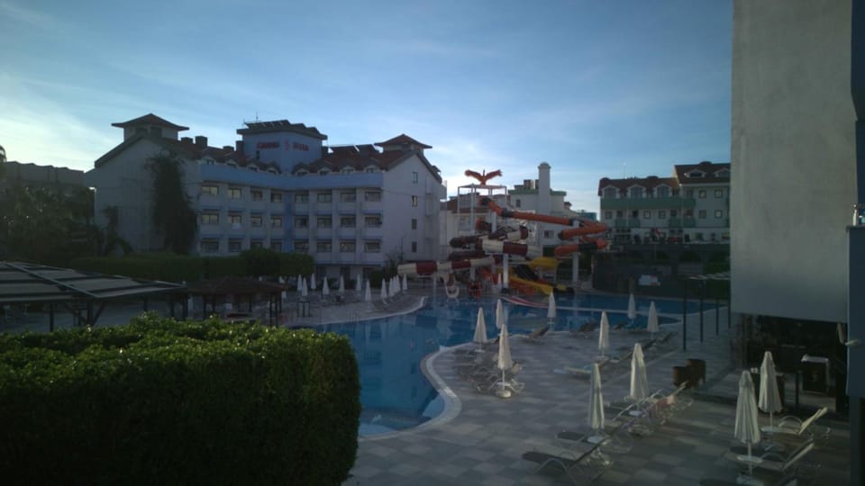 Property building, Day, Pool view, Swimming pool, sunbed