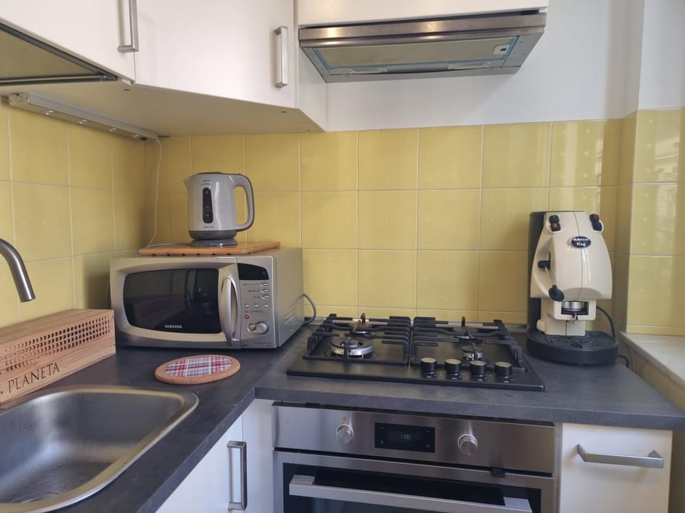 Kitchen or kitchenette, stove