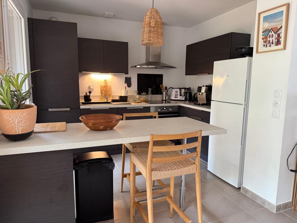 Kitchen or kitchenette, dishwasher, oven, stove, toaster
