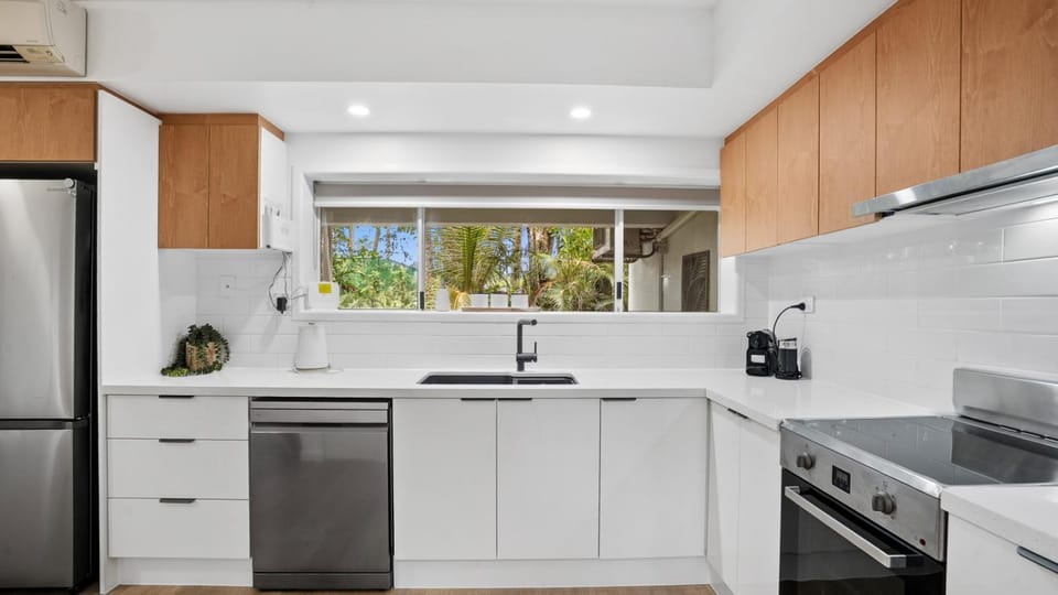 Kitchen or kitchenette, dishwasher, oven, stove, toaster