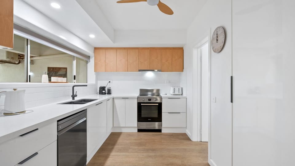 Kitchen or kitchenette, dishwasher, oven, stove, toaster