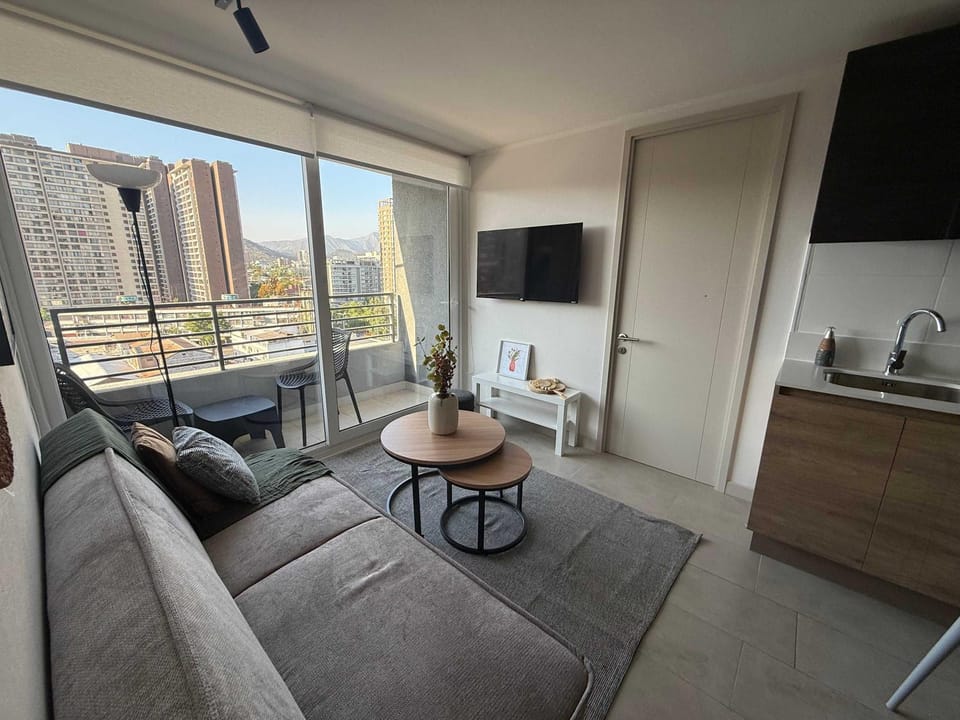 Cozy 2BR Escape for Three in Vibrant Nunoa Apartment in Santiago