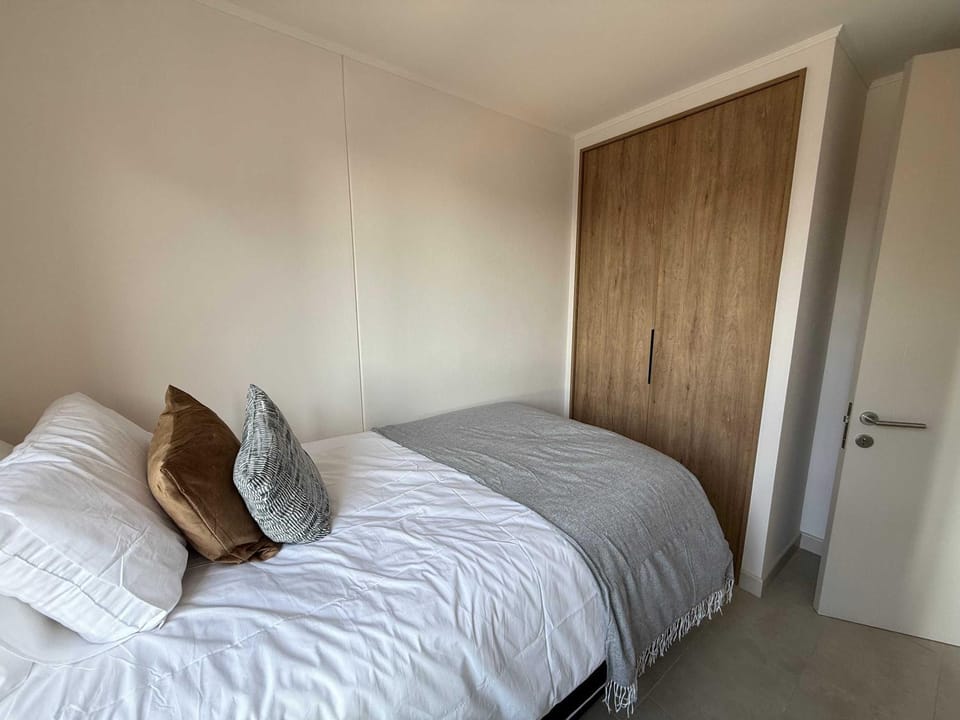Cozy 2BR Escape for Three in Vibrant Nunoa Apartment in Santiago