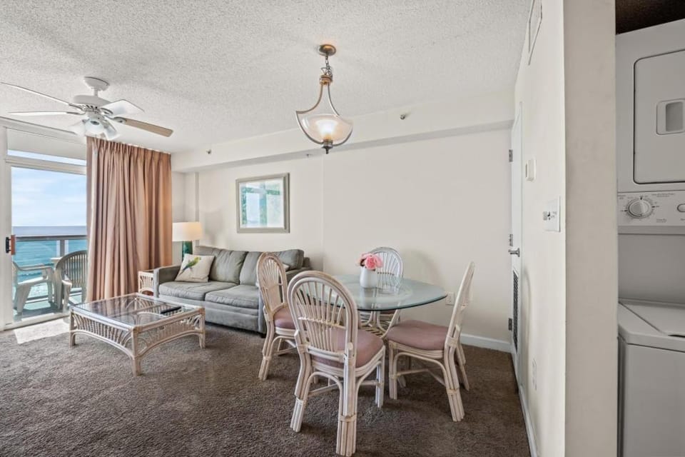 Natural landscape, TV and multimedia, Living room, Seating area, Dining area, Beach, Sea view, washing machine, dryer