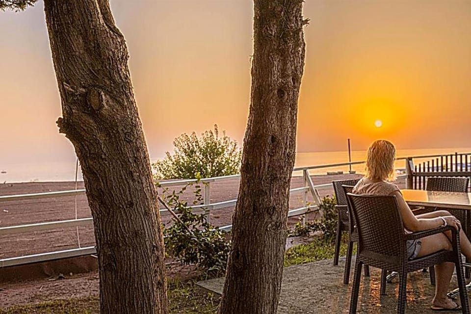 People, Natural landscape, View (from property/room), Sunset