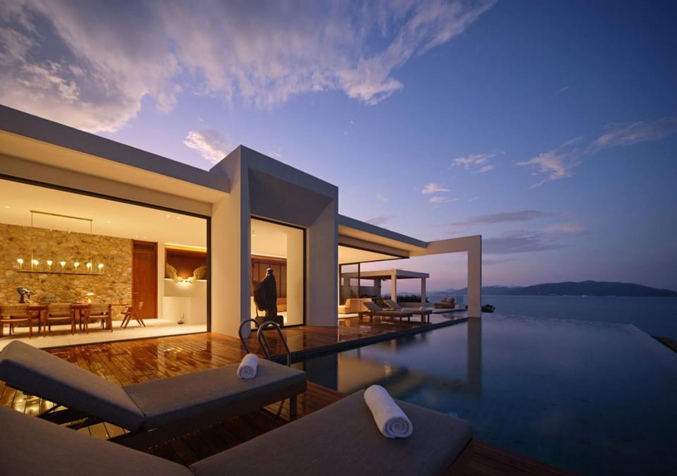 Property building, Patio, Nearby landmark, Natural landscape, Dining area, Pool view, Sea view, Swimming pool, Dinner, Sunset, sunbed