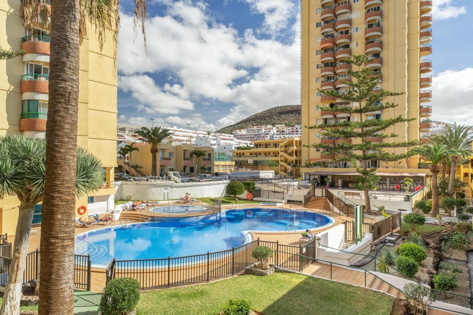Property building, Living room, Swimming pool