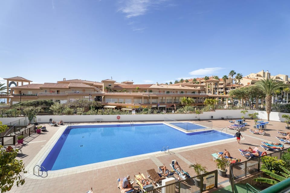 Property building, Living room, Swimming pool