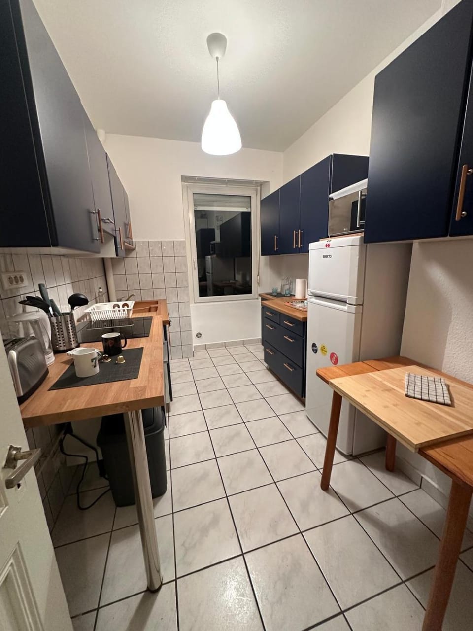 Kitchen or kitchenette, oven, stove, toaster