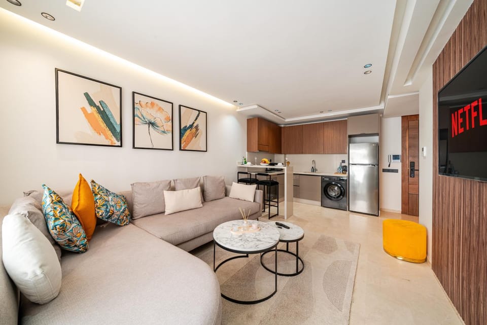 TV and multimedia, Kitchen or kitchenette, Living room, Seating area, Dining area, oven, stove, toaster, washing machine