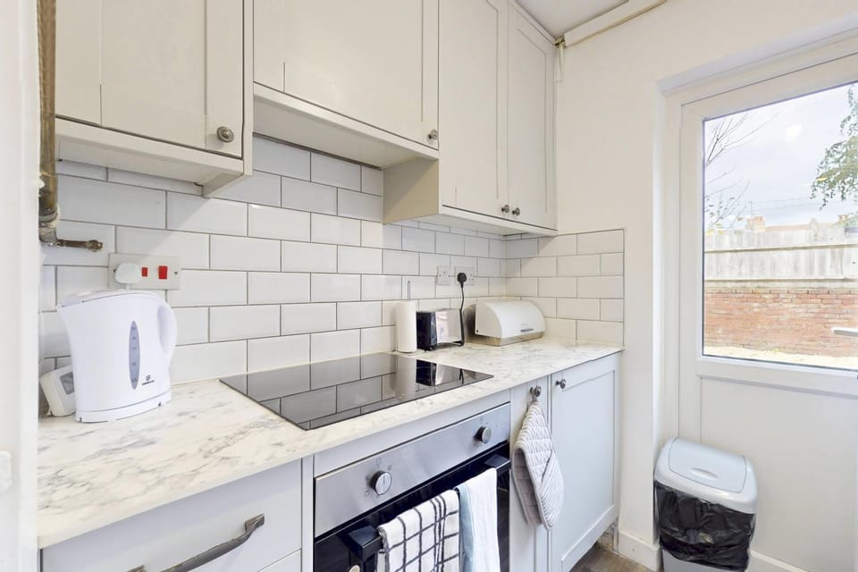 Kitchen or kitchenette, stove, toaster