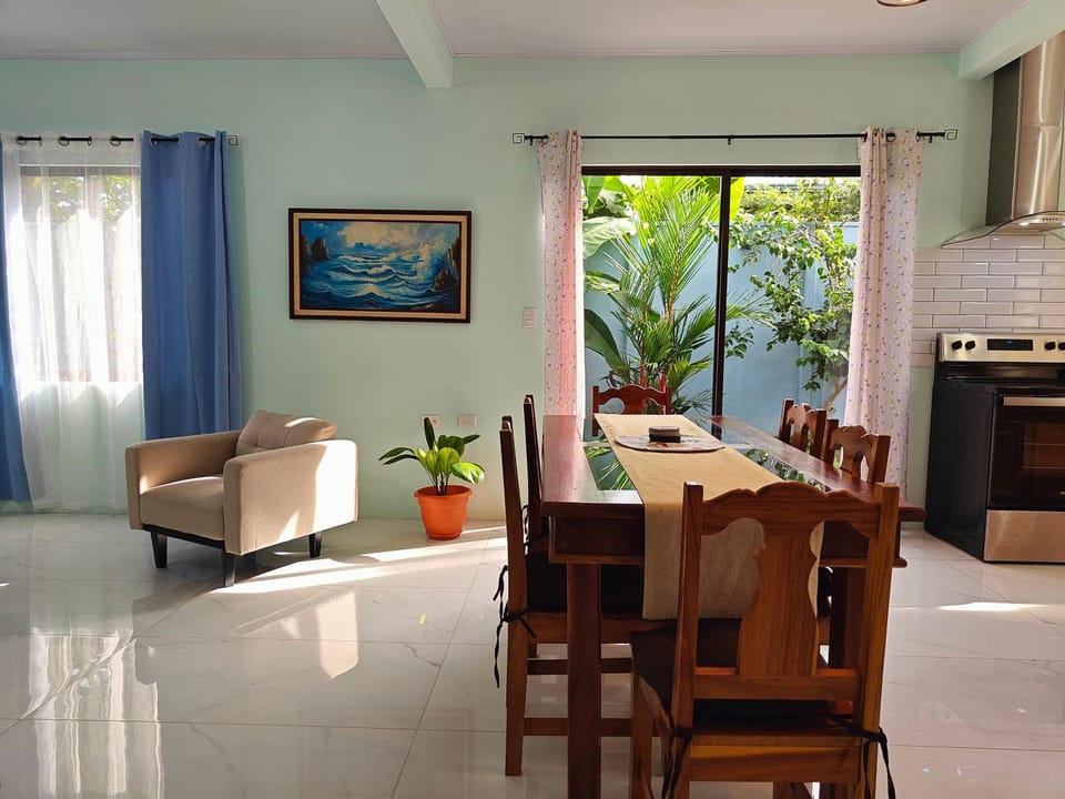 AJ House - Spacious 4BR Home, Balcony, BBQ area, Shared Pool House in Uvita