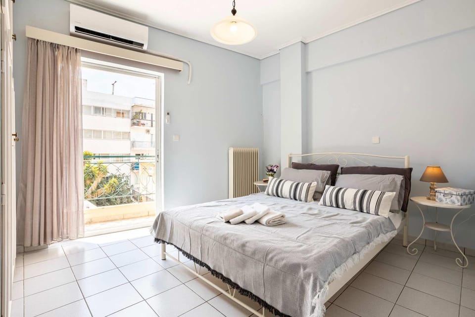 Bed, Photo of the whole room, Bedroom, towels, air conditioner