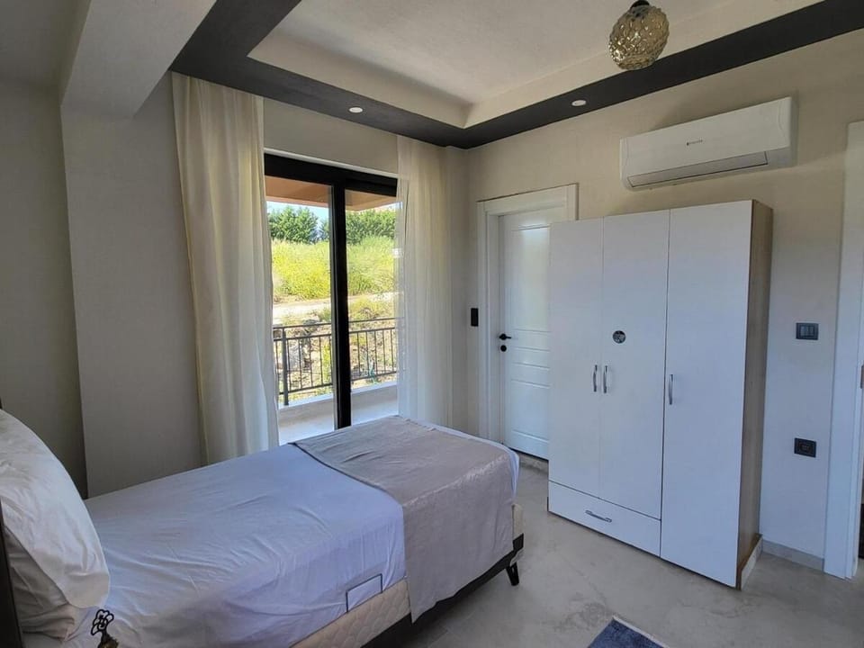 Bed, wardrobe, air conditioner
