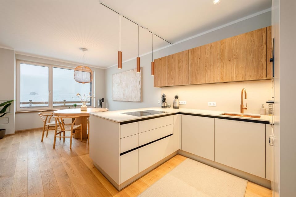 Kitchen or kitchenette, dishwasher, oven, stove