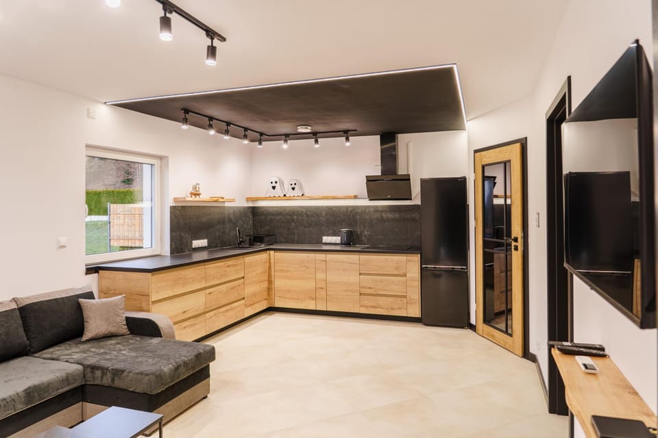 Communal lounge/ TV room, TV and multimedia, Kitchen or kitchenette, Living room, Seating area, dishwasher, stove, washing machine