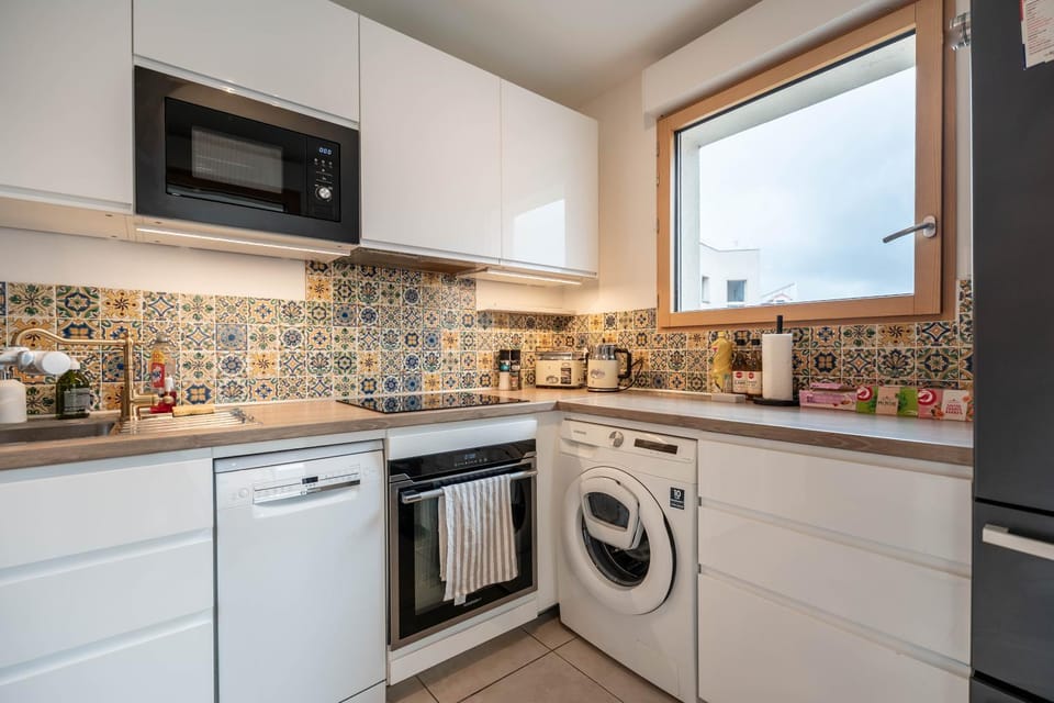 Kitchen or kitchenette, dishwasher, oven, stove, toaster