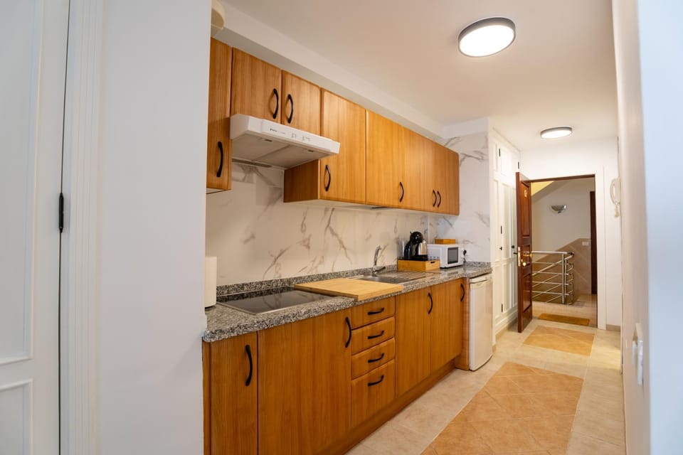 Kitchen or kitchenette, oven, stove