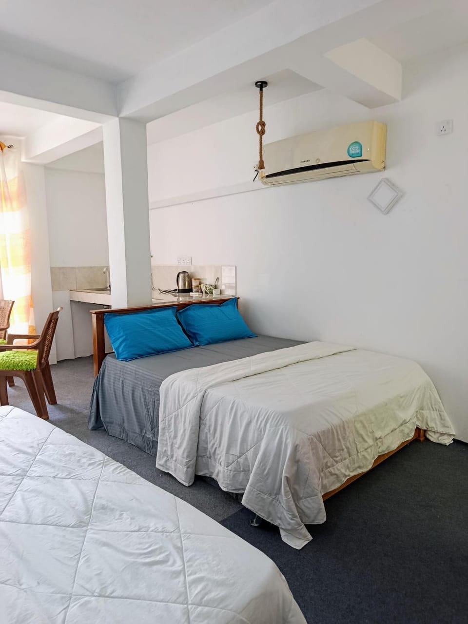 Photo of the whole room, air conditioner