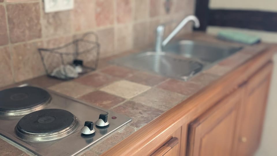 Kitchen or kitchenette, stove