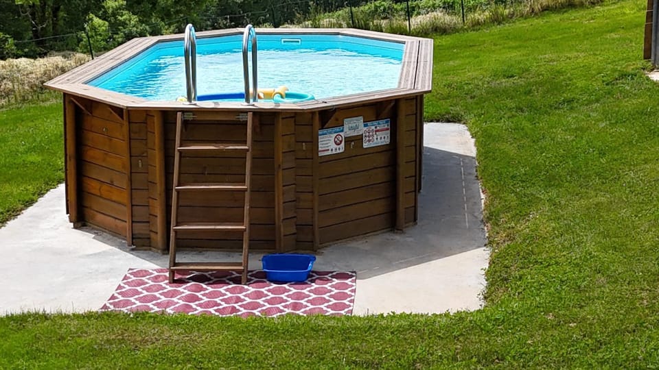 Property building, Living room, Swimming pool