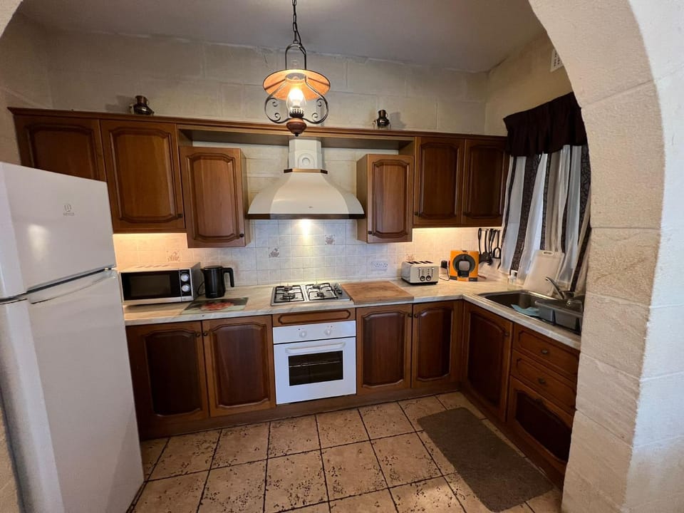 Kitchen or kitchenette, oven, stove, toaster