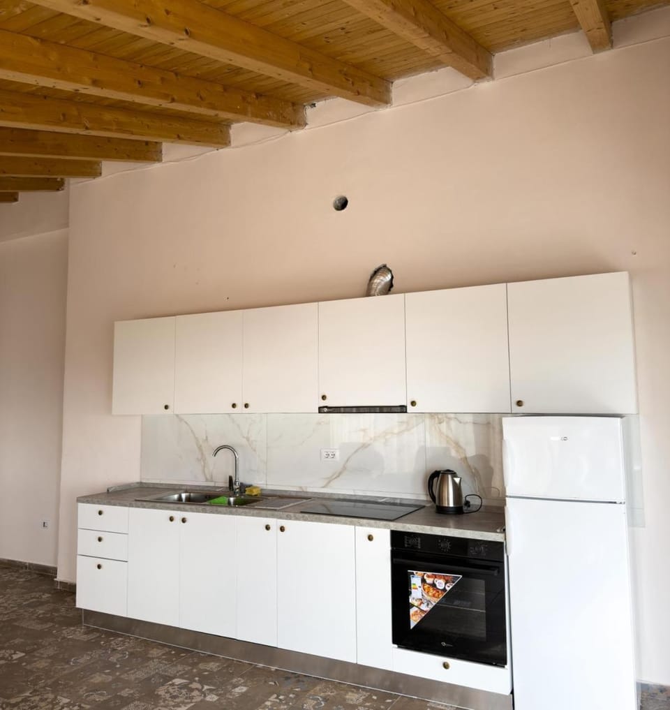 Kitchen or kitchenette, stove