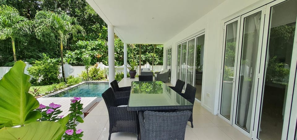 Patio, Spring, Day, Garden, View (from property/room), Balcony/Terrace, Balcony/Terrace, Living room, Seating area, Garden view, Pool view, Swimming pool