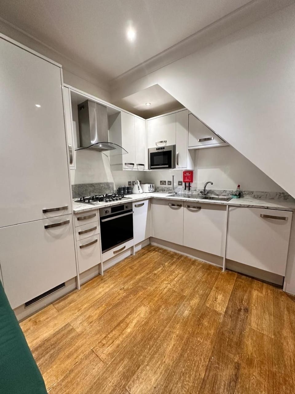 Kitchen or kitchenette, stove, toaster