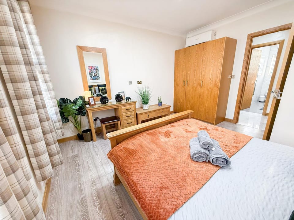 Bed, Seating area, Bedroom, storage, towels, wardrobe, air conditioner