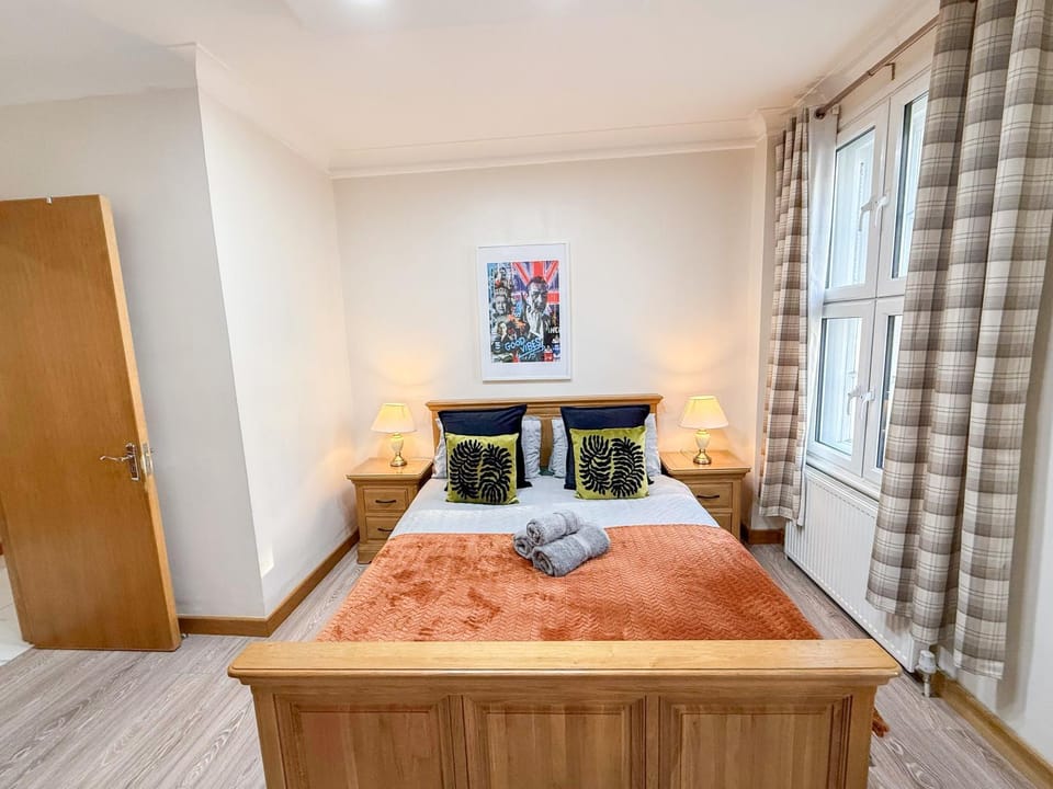 Bed, Photo of the whole room, Decorative detail, Bedroom, flat iron, hair dryier, storage, towels, wardrobe, air conditioner