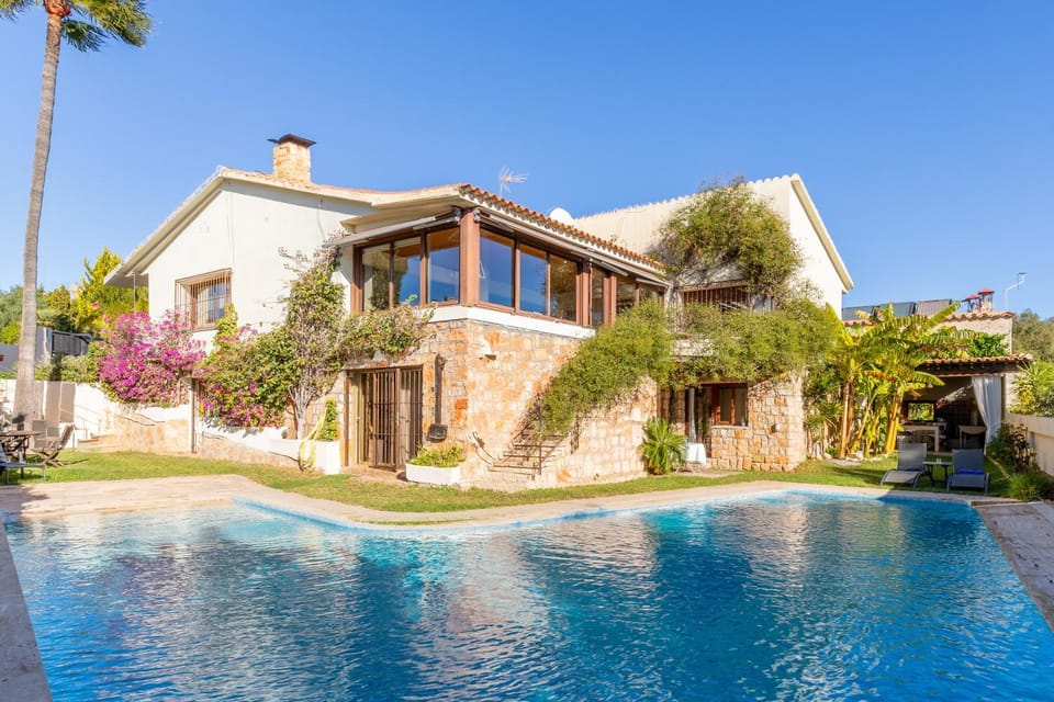 Property building, Living room, Swimming pool