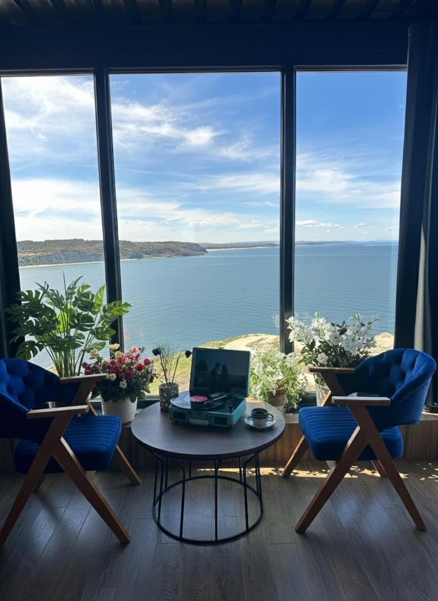 Day, Natural landscape, View (from property/room), Living room, Seating area, Dining area, Sea view