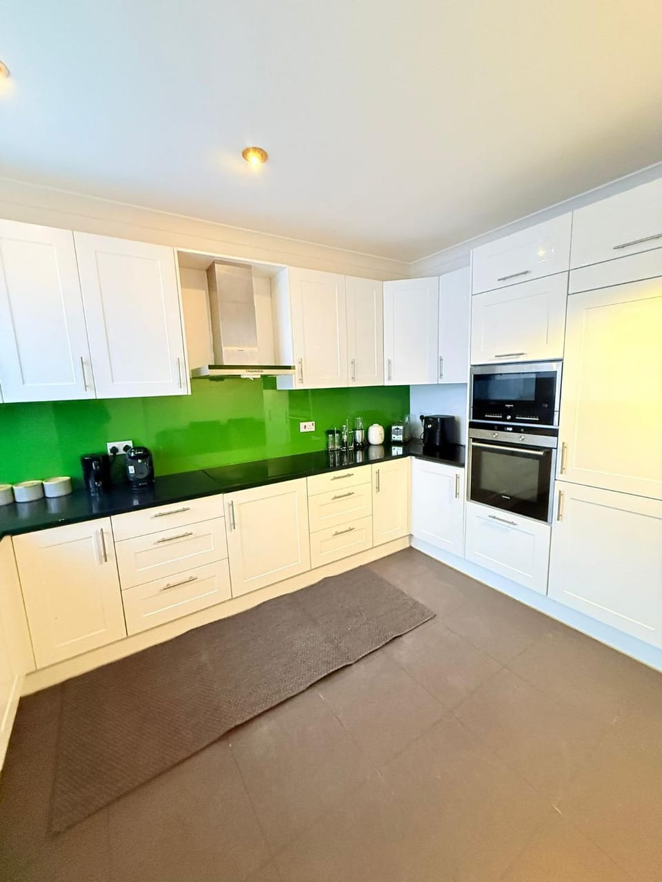 Kitchen or kitchenette, oven, stove, toaster