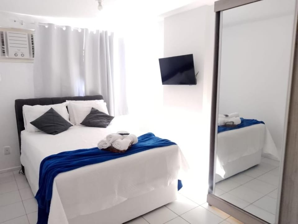 Bedroom, towels, wardrobe, air conditioner