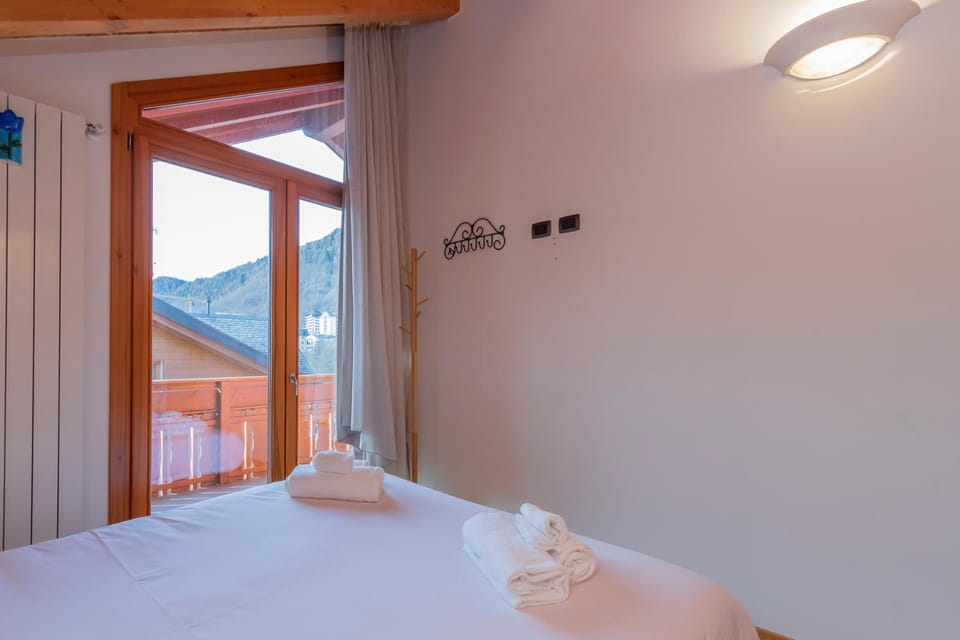 Cadore Accogliente Mansarda a 20m dalle Piste Aprica Apartment in Aprica