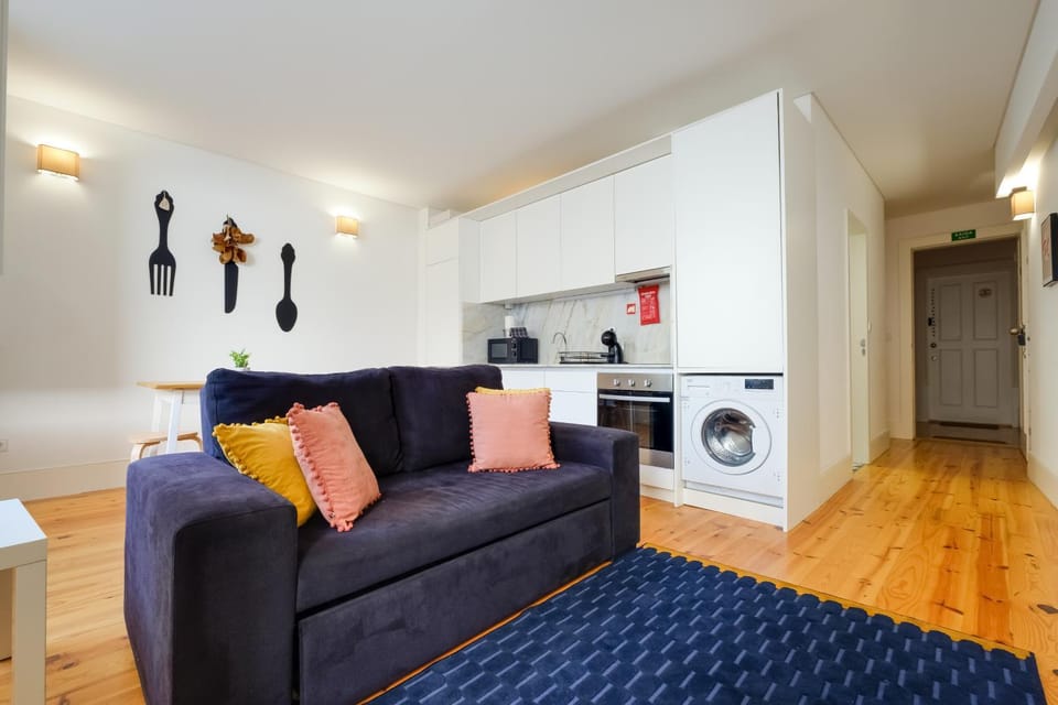 Kitchen or kitchenette, Living room, Seating area, stove, washing machine