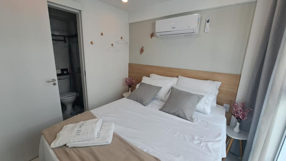 Bed, Photo of the whole room, Bedroom, towels, air conditioner