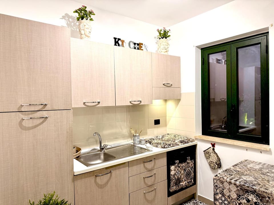 Kitchen or kitchenette, stove