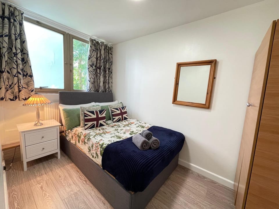 Bed, Photo of the whole room, Bedroom, flat iron, hair dryier, storage, towels, wardrobe