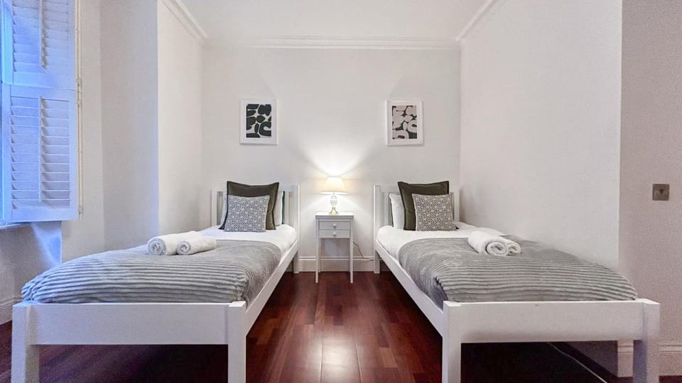 Bed, Decorative detail, Seating area, Bedroom, towels, wardrobe
