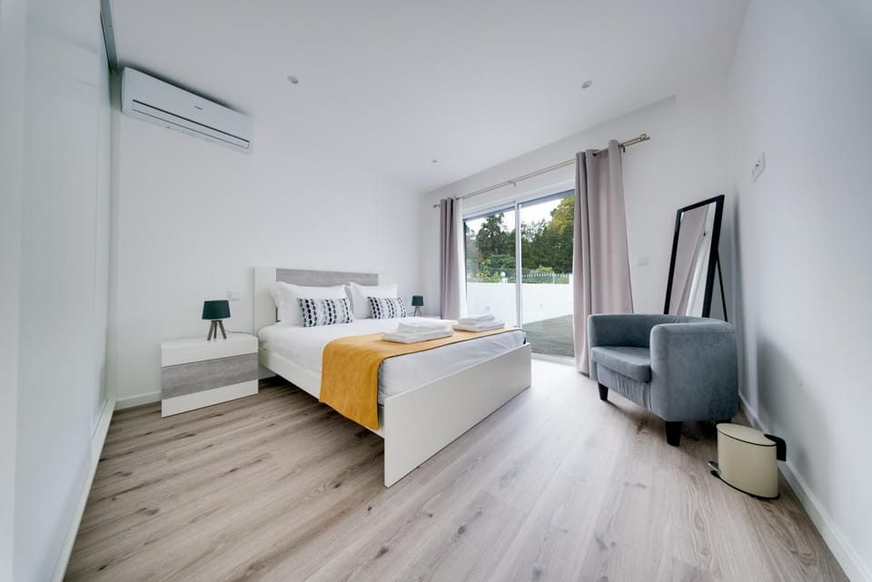 Bedroom, furniture, towels, air conditioner