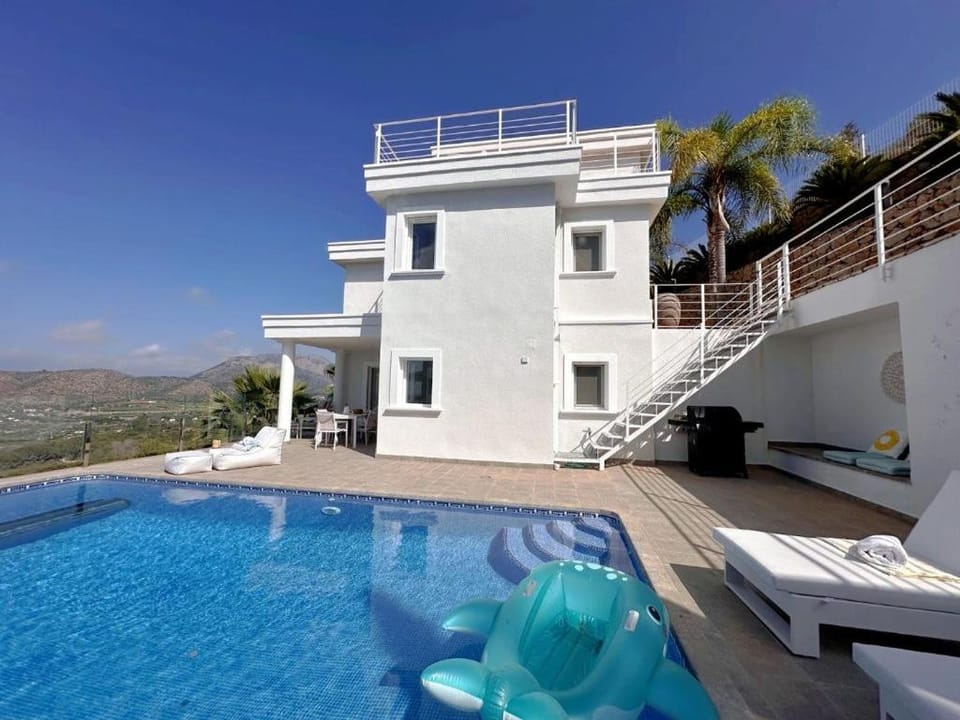 Property building, Day, Natural landscape, View (from property/room), Pool view, Swimming pool, sunbed