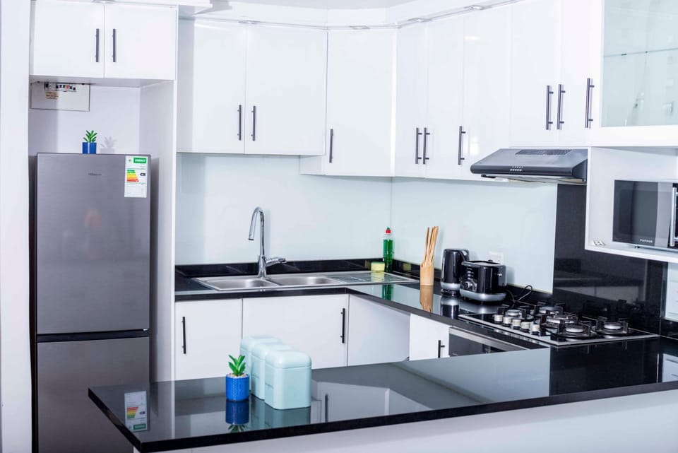 Kitchen or kitchenette, oven, stove
