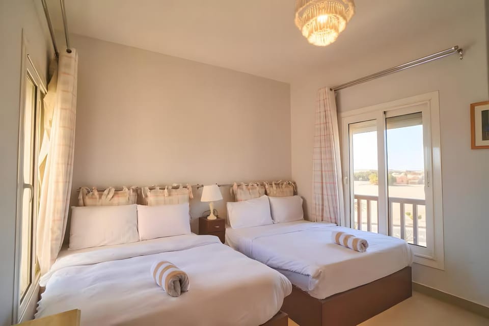 Photo of the whole room, Bedroom, towels, air conditioner