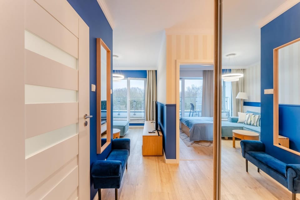 Bed, Living room, Seating area, Bedroom