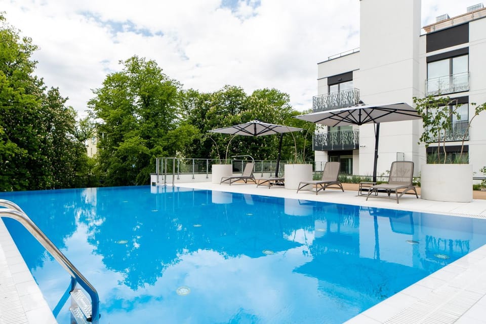 Property building, Pool view, Swimming pool, sunbed