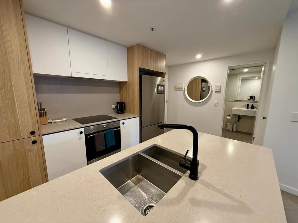 Kitchen or kitchenette, dishwasher, oven, stove, toaster